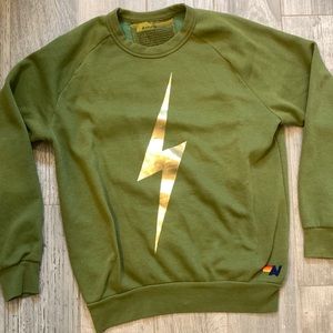 green and gold lightening bolt crew